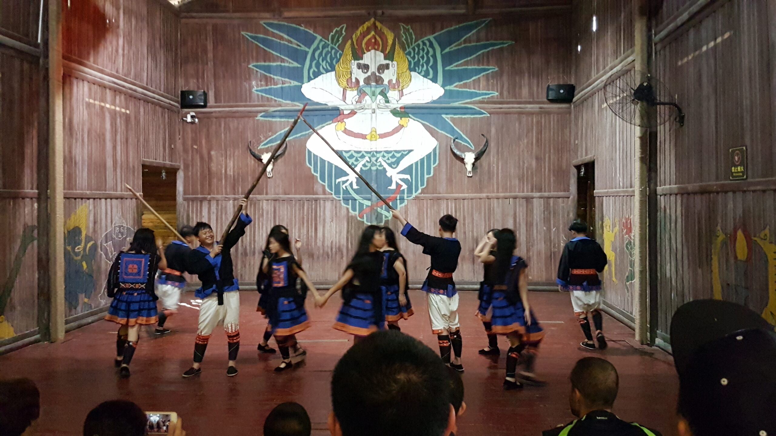 Yao artistic performance at the theatre of Putaoshan village.